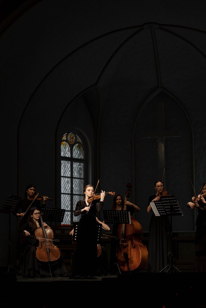 Violinist performing in a church